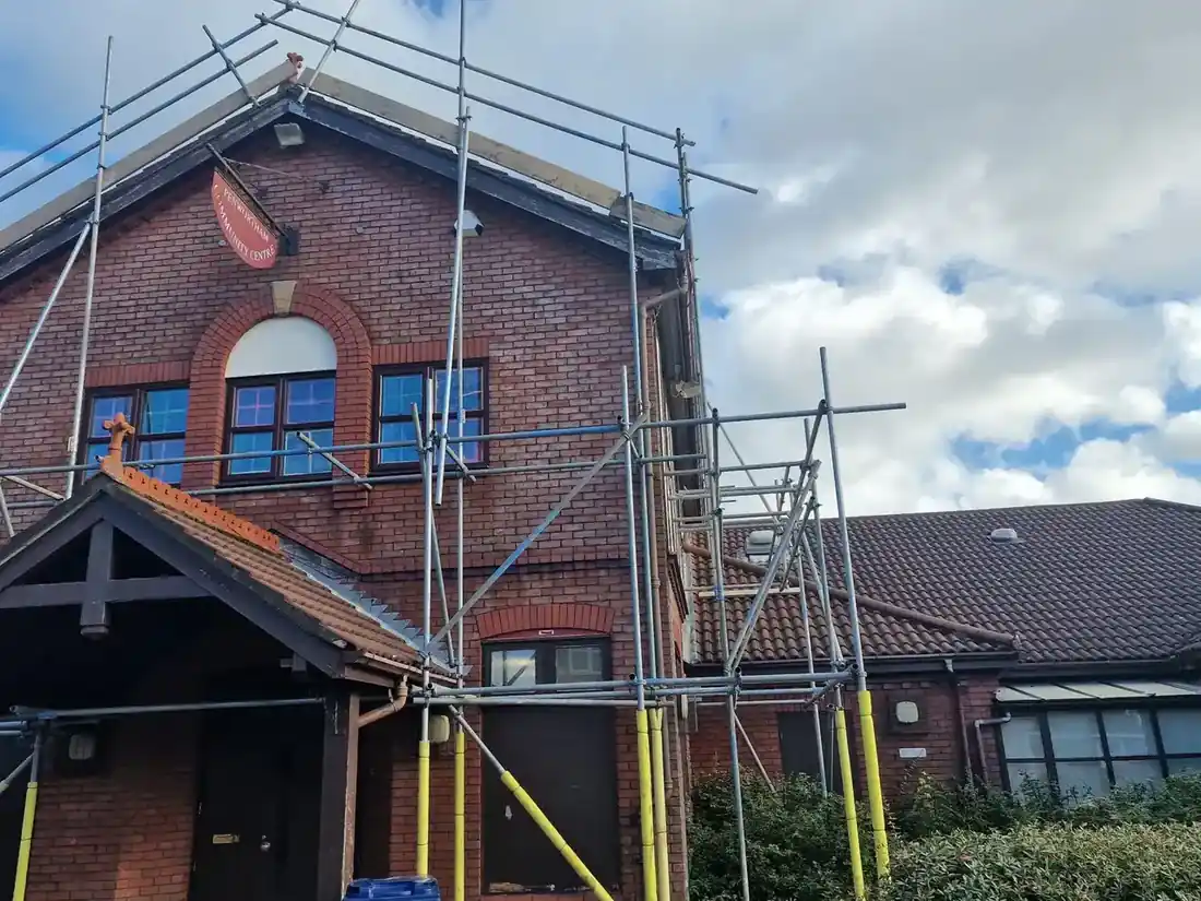 Scaffolding on a detached brick house by Preston Scaffolding NW