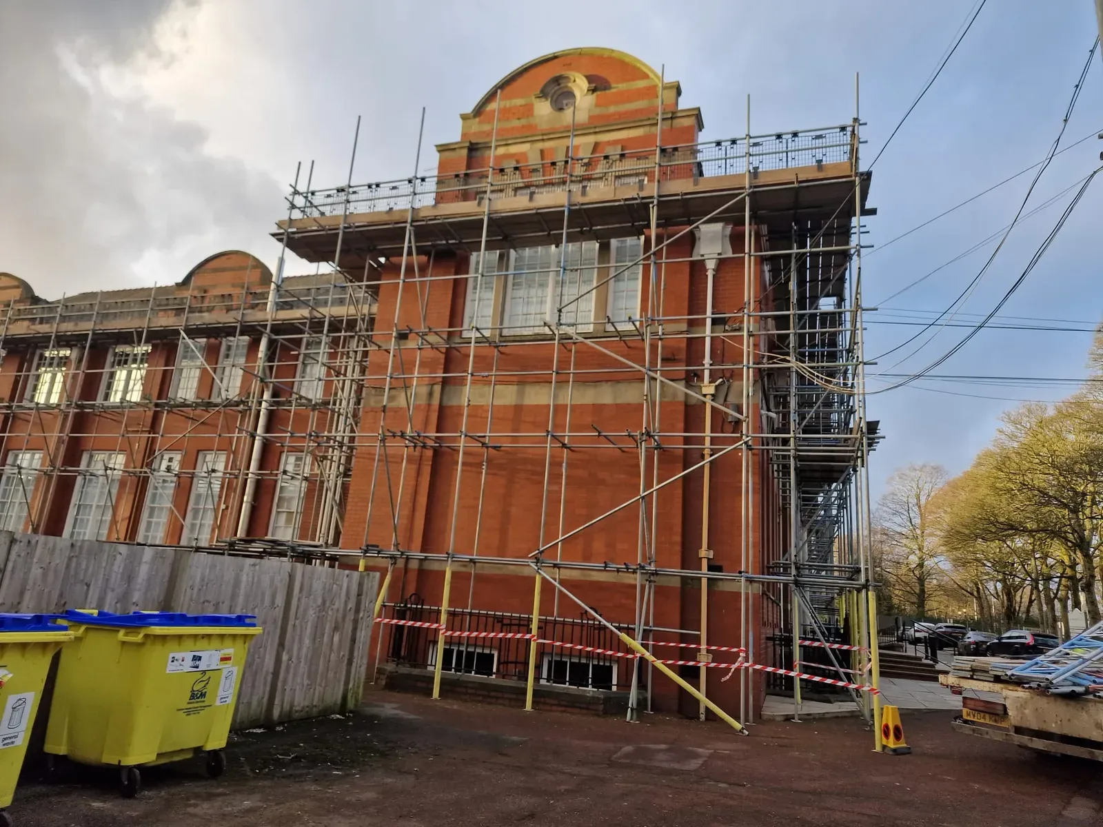 Access scaffolding on a Victorian red brick building