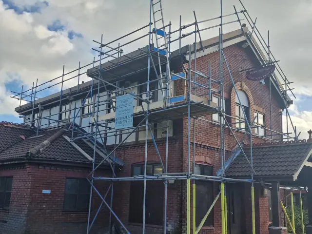 Corner scaffold on a brick property — Preston Scaffolding NW, scaffolders covering Goosnargh