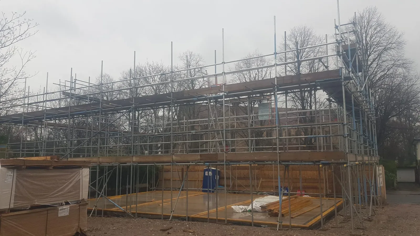 Birdcage scaffold with loading bay on a new build