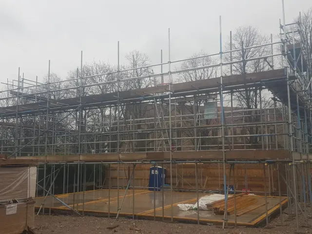 Birdcage scaffold with loading bay on a new build — Preston Scaffolding NW, scaffolders covering Preston