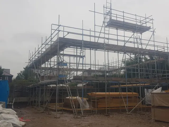 New build birdcage scaffold with inspection tower — Preston Scaffolding NW, scaffolders covering Preston