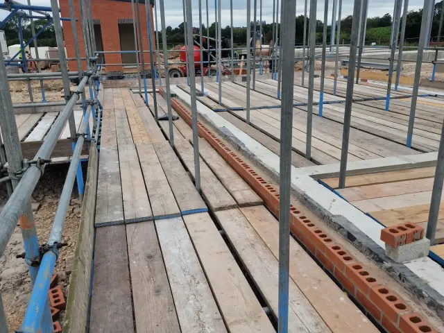 Scaffold lifts and boarded platforms for brickwork — Preston Scaffolding NW, scaffolders covering Lancaster